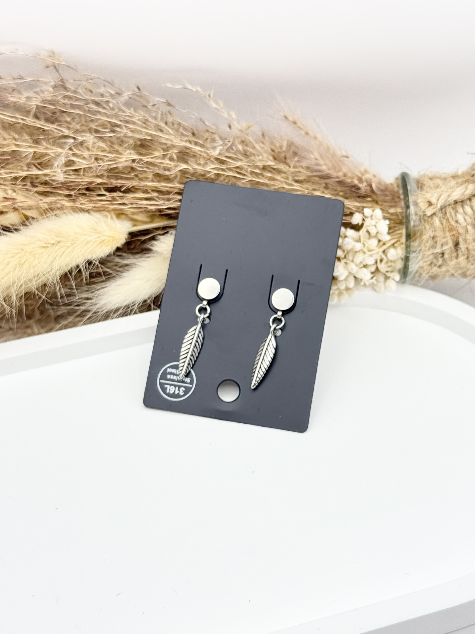 Wholesaler Ceramik - 316L stainless steel earrings/piercings with screw closure