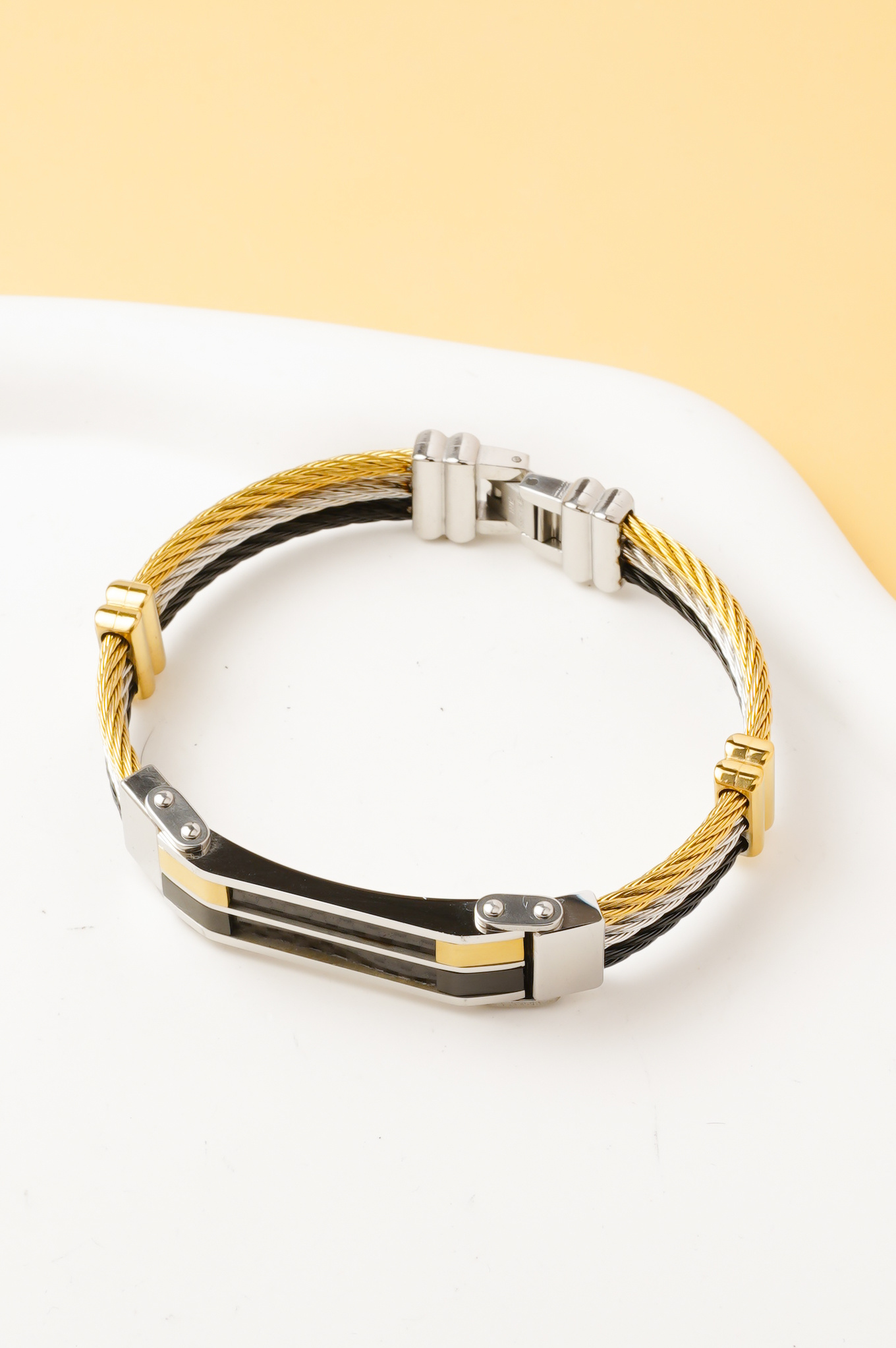 Mayorista Ceramik - Pulsera de hombre de acero inoxidable trenzado bicolor en plata, dorado y negro – Diseño moderno y elegante