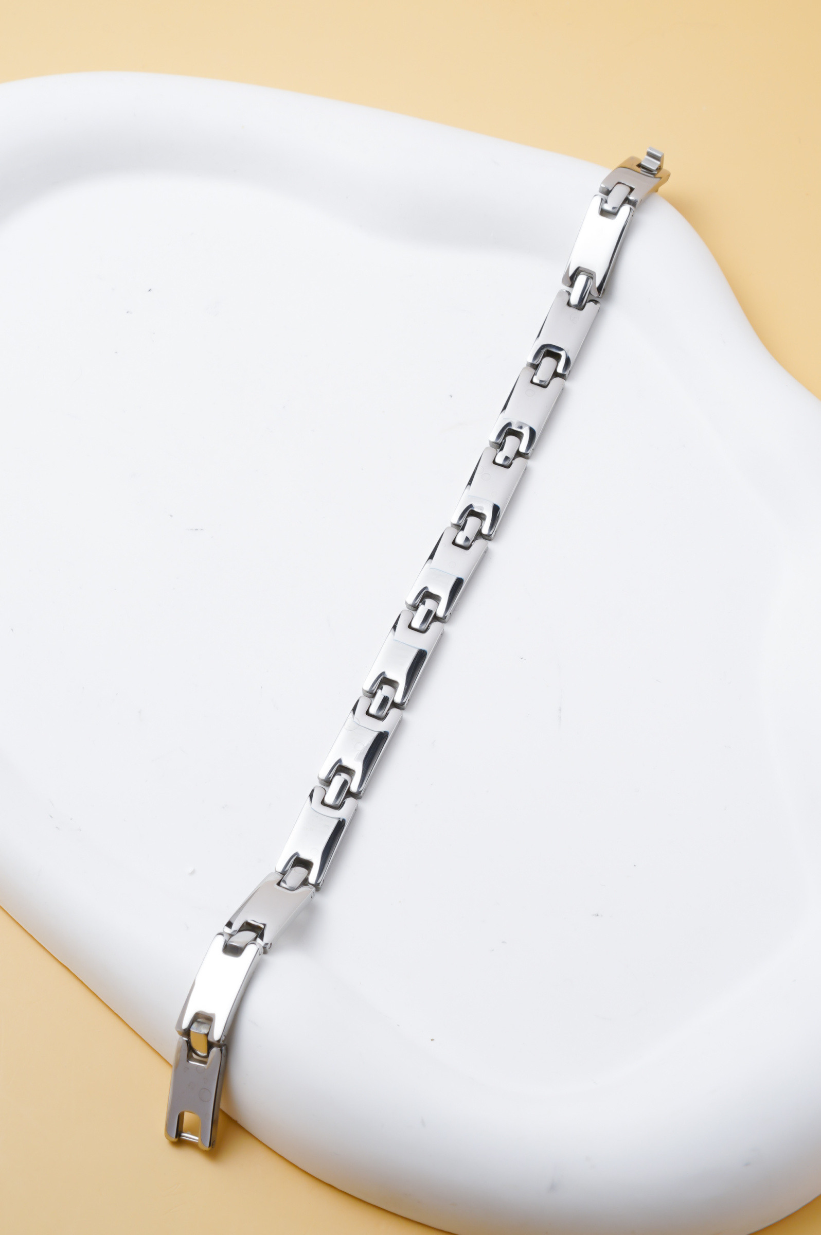 Mayorista Ceramik - Pulsera de hombre de acero inoxidable plateado – eslabones finos calados geométricos – acabado brillante – 20 cm