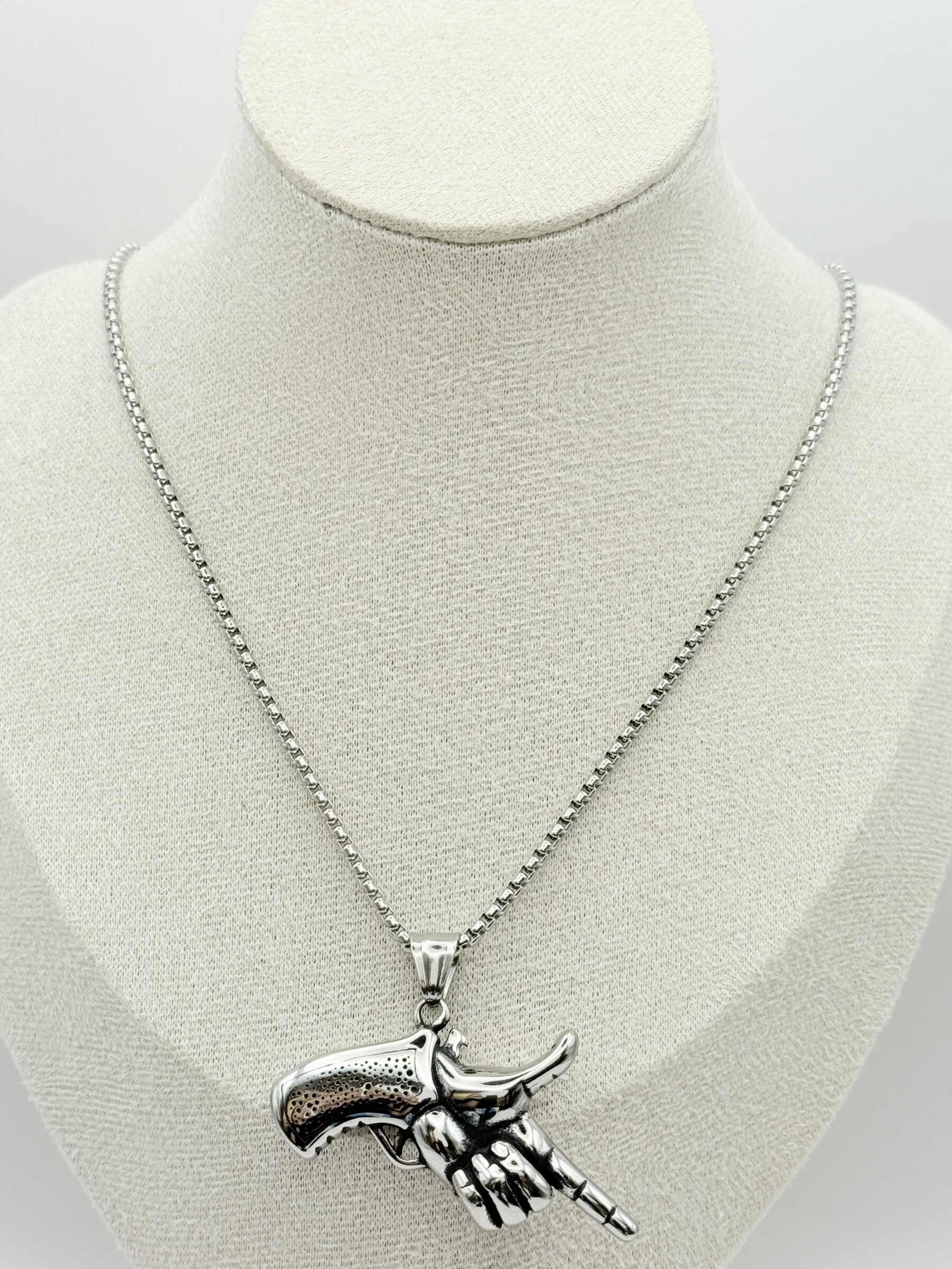 Wholesaler Ceramik - Necklace with stainless steel hand gun pendant
