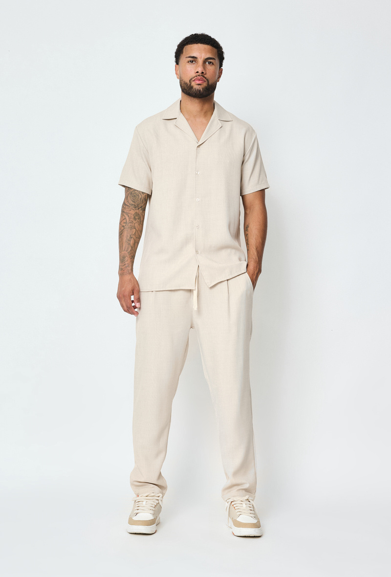 Grossista Frilivin - Completo camicia a maniche corte e pantaloni