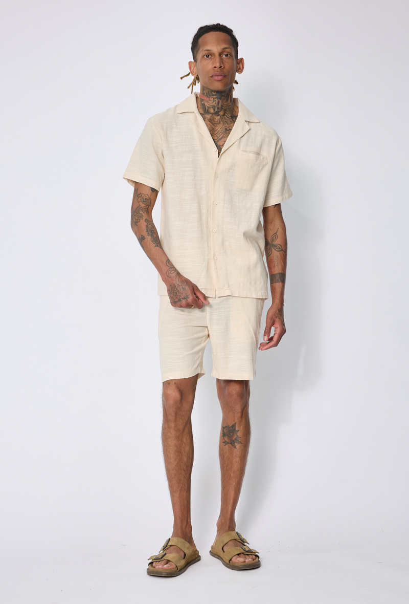 Großhändler Frilivin - Hemd mit Knöpfen, Shorts, Tasche.