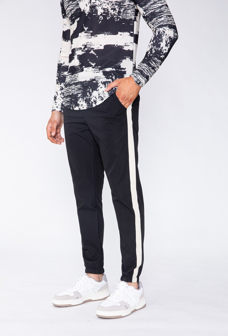 Grossista Frilivin - Pantaloni stile jogging con bande laterali ricamate