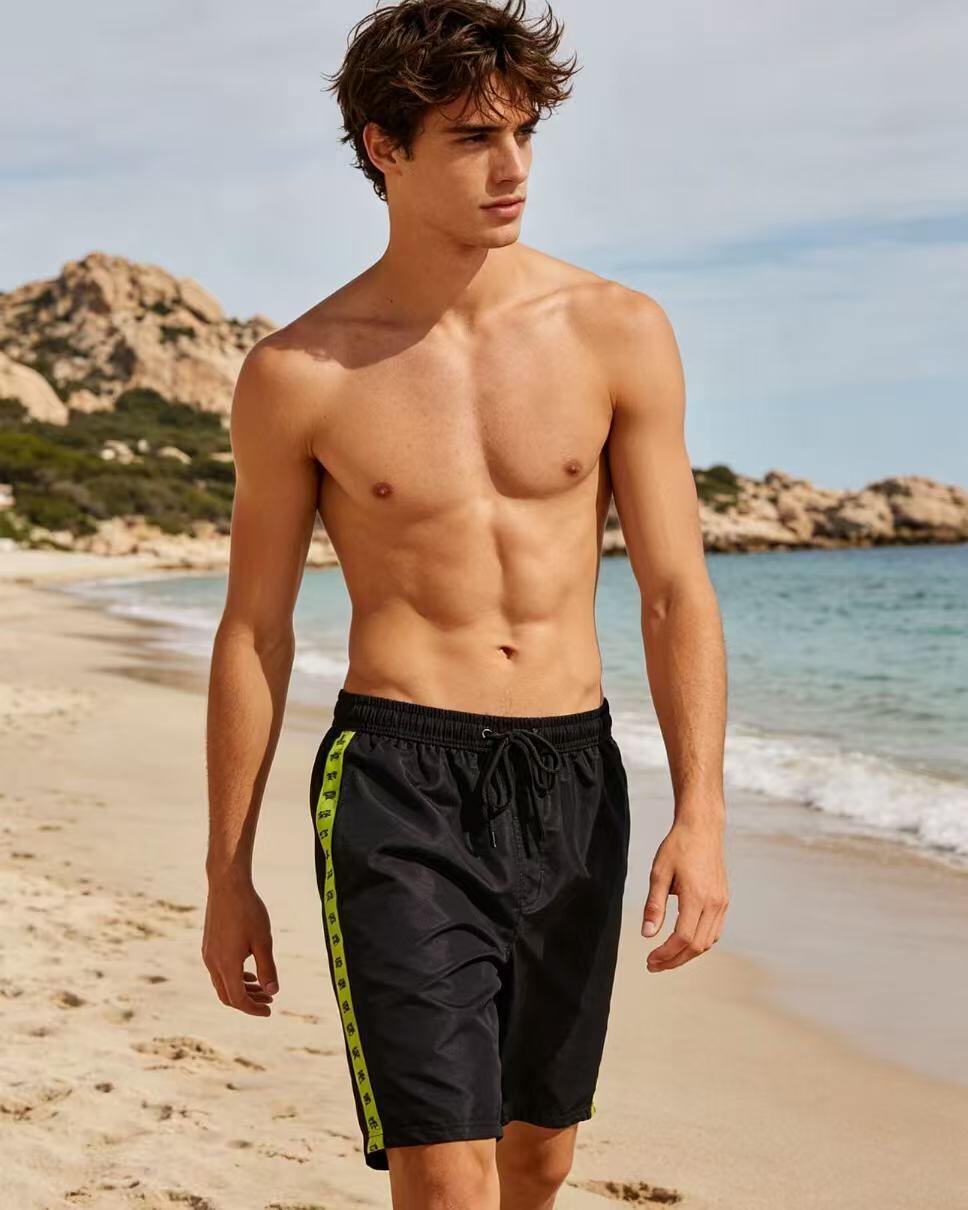 Grossiste JERRY.AMY - SHORTS DE PLAGE HOMME EN POLYESTER (AVEC FILET)