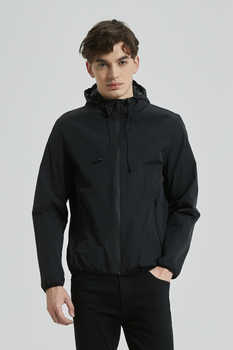 Wholesaler KYMAXX - Lightweight water-repellent plain jacket with integrated hood and multi-pockets