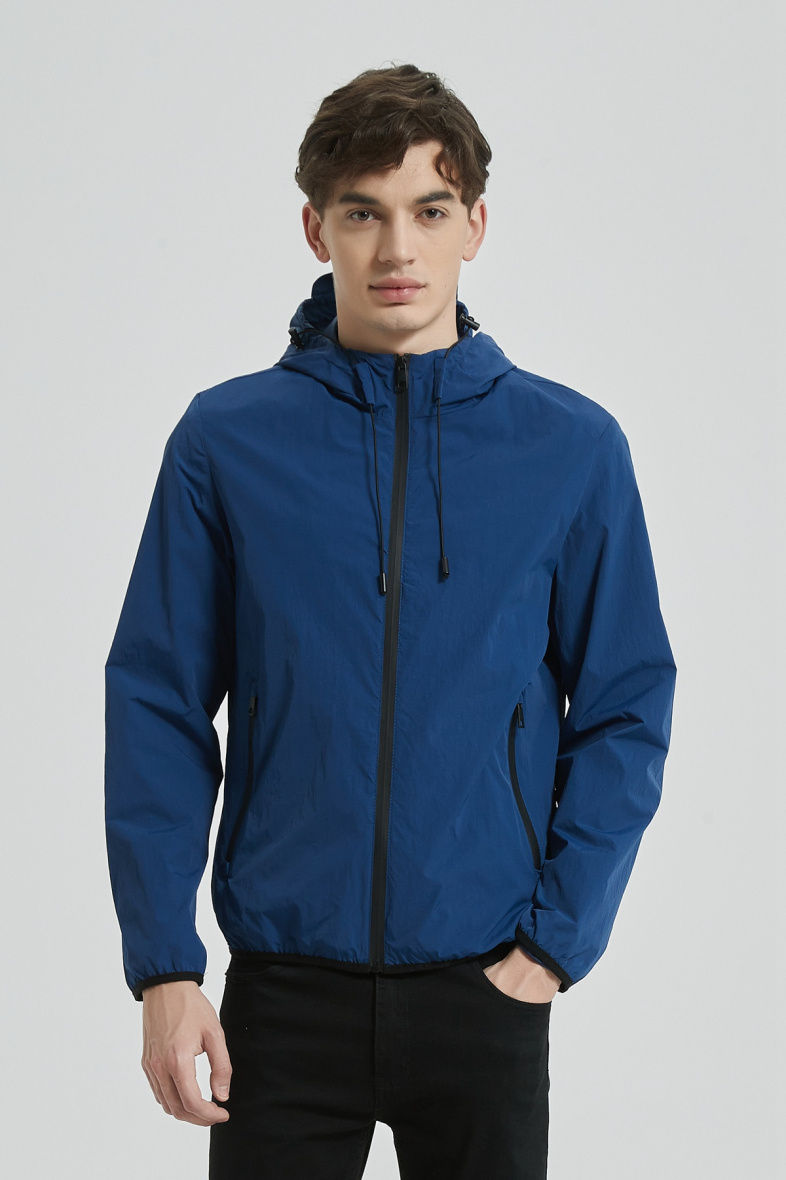 Wholesaler KYMAXX - Lightweight water-repellent plain jacket with integrated hood and multi-pockets