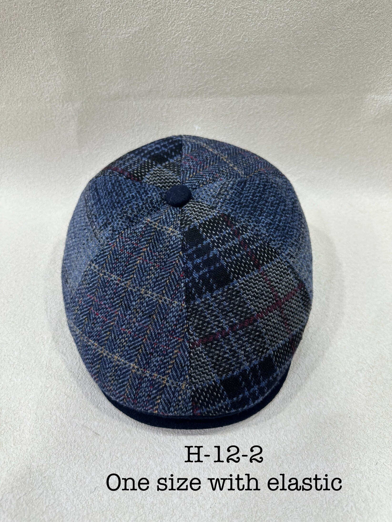 Grossista LEXA PLUS - Cappello piatto in tweed patchwork blu