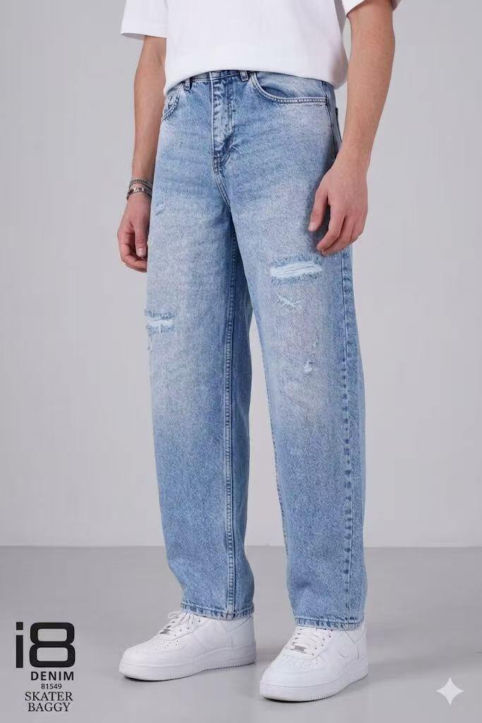Grossista Mentex Homme - Jeans baggy azzurri da uomo con strappi lavorati sul davanti e effetto scolorito