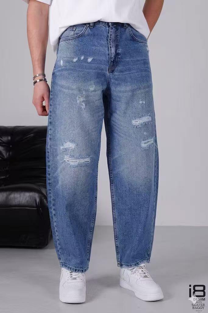 Grossiste Mentex Homme - Jeans coupe baggy bleu homme déchirures travaillées à l'avant avec effet delave