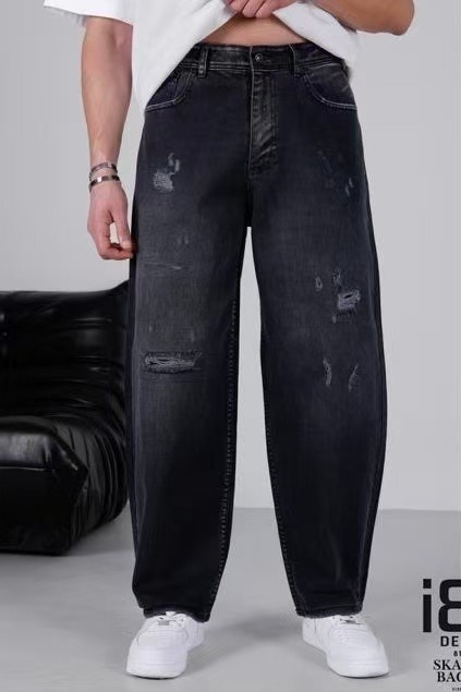 Großhändler Mentex Homme - Schwarze Baggy-Jeans für Herren mit aufwendig gestalteten Rissen vorne