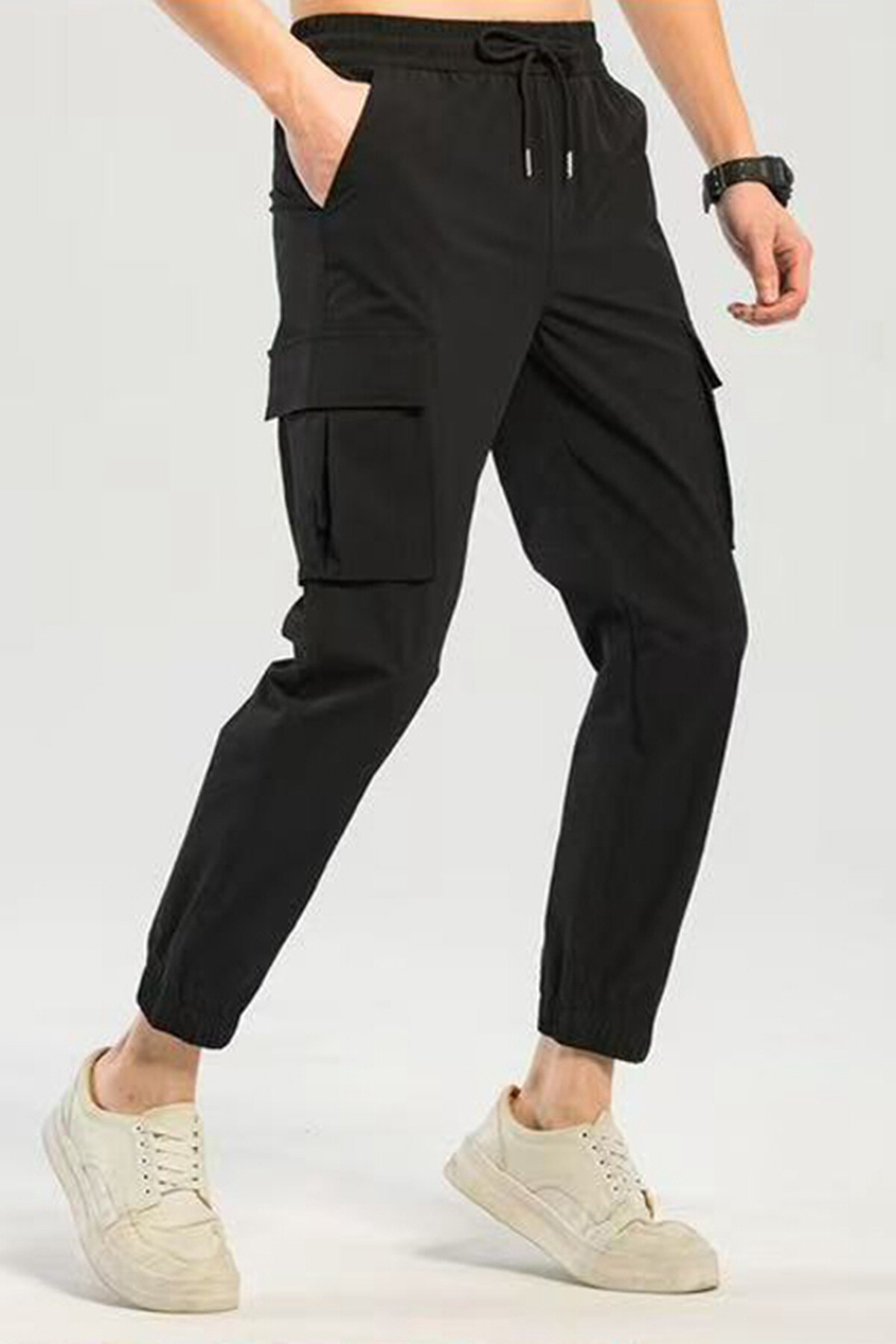 Großhändler Mentex Homme - Unifarbene Fallschirmhose mit Cargo-Effekt und Kordelzug