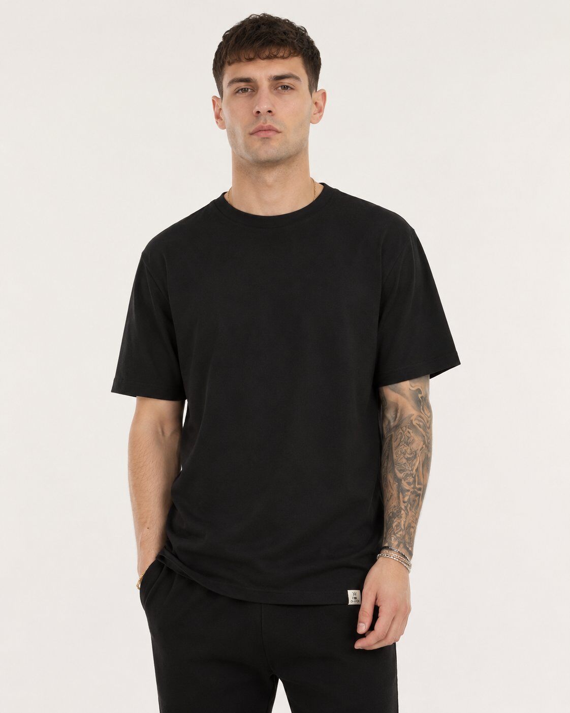 Großhändler Mentex Homme - Minimalistisches Schwarzes Texturiertes T-Shirt