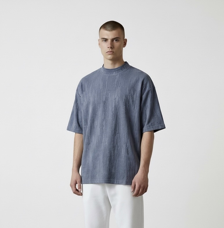 Grossista Omnimen - T-shirt oversize effetto lavato con texture