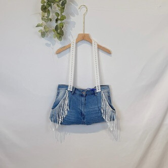 Wholesaler Sexy Woman - Jeans with fashionable fringes and versatile, elegant, versatile and practical.