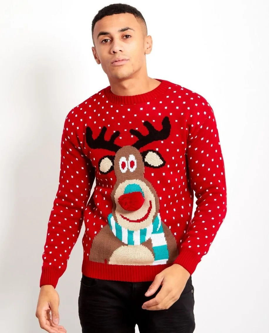 Adoptez l'esprit festif avec ce pull de Noël fabriqué au Royaume-Uni, 100 % acrylique, arborant un charmant motif de cerf, parfait pour la chaleur hivernale.