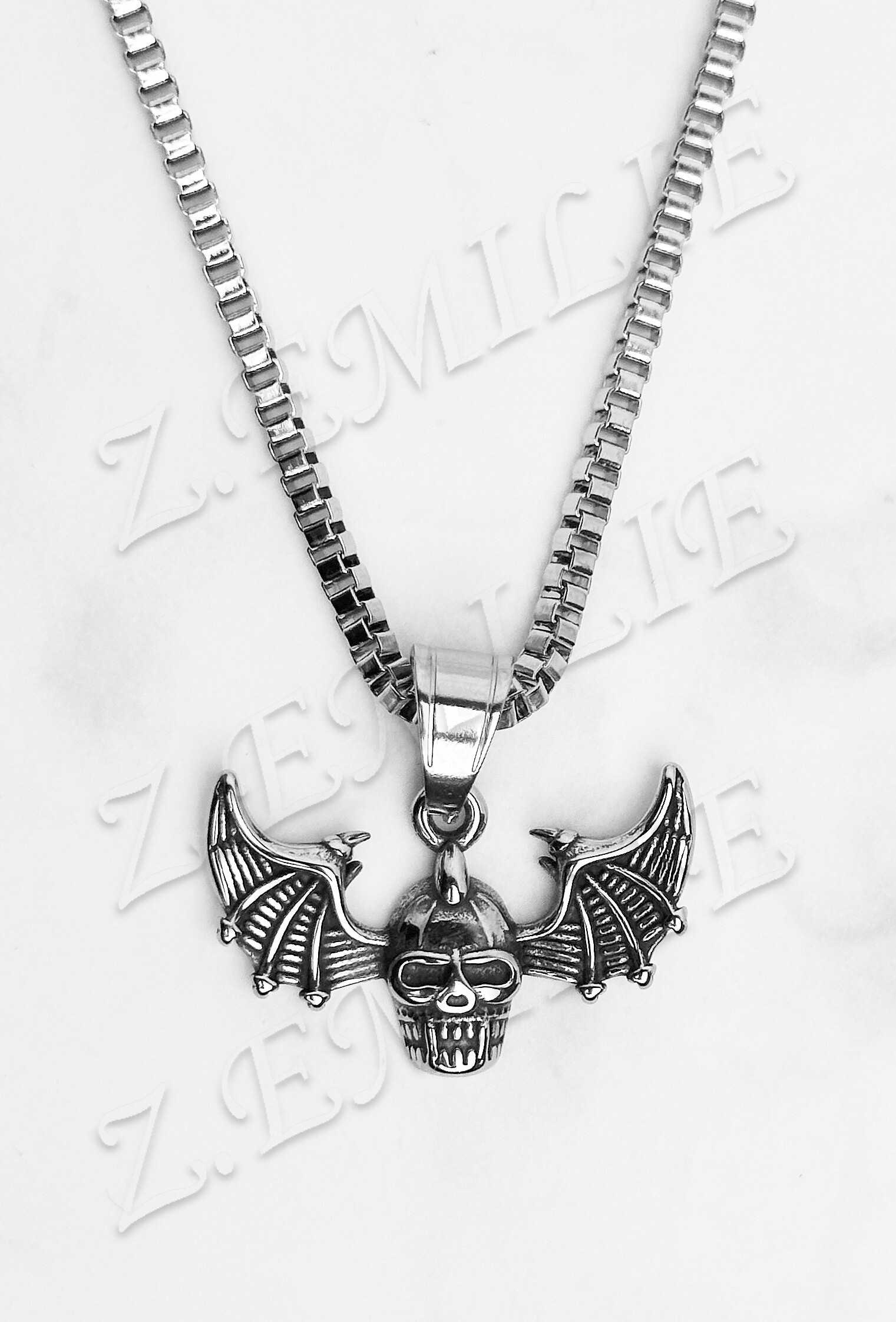 Wholesaler Z. Emilie - Steel skull necklace with wings