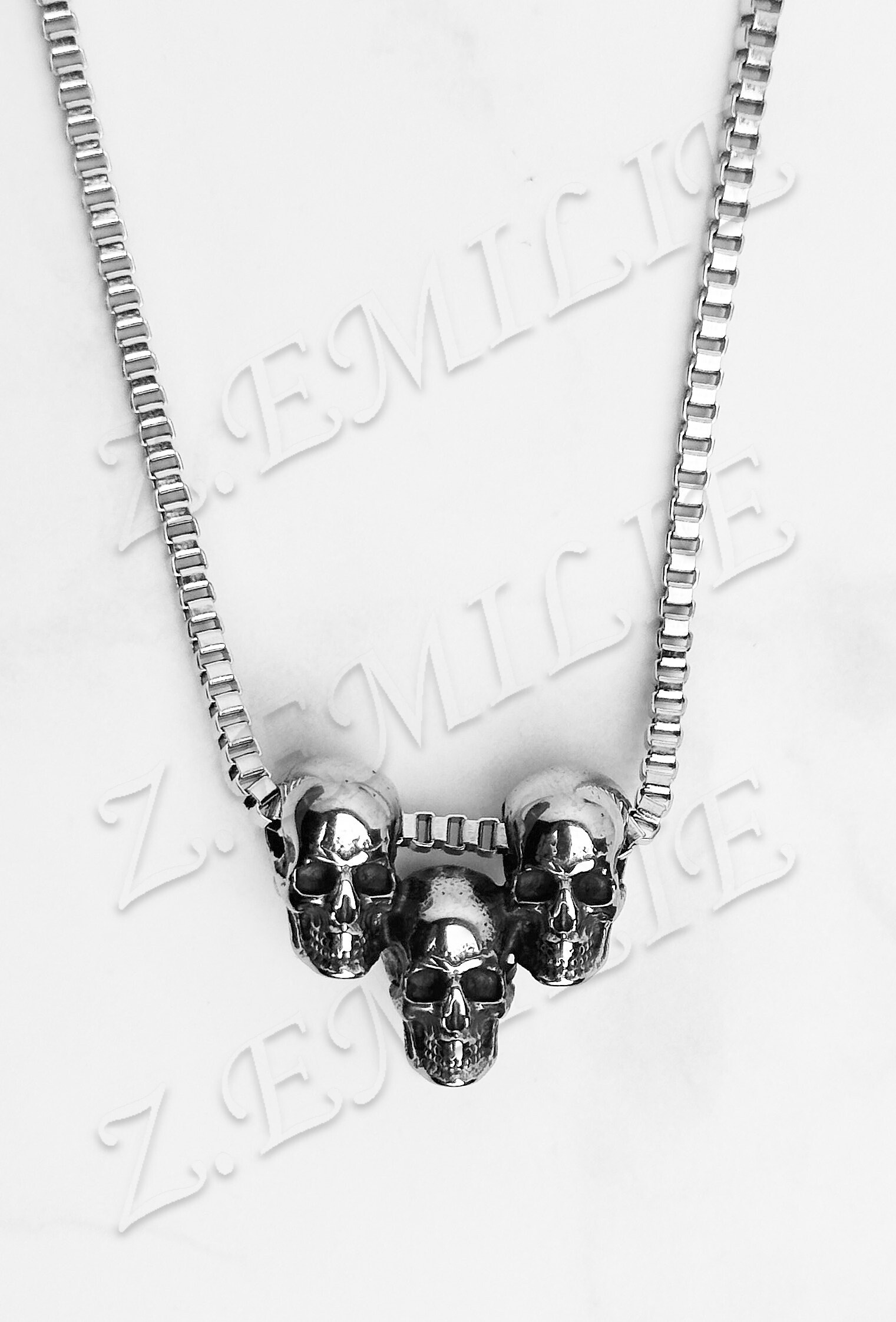 Wholesaler Z. Emilie - Triple stainless steel skull necklace